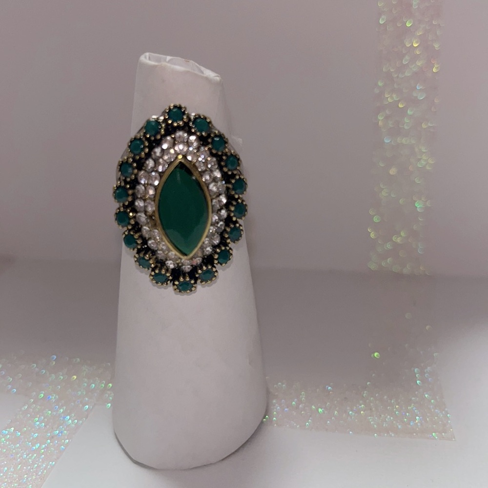 Silver toned Bohemian style ring size 10. Emerald colored stones and cz crystals